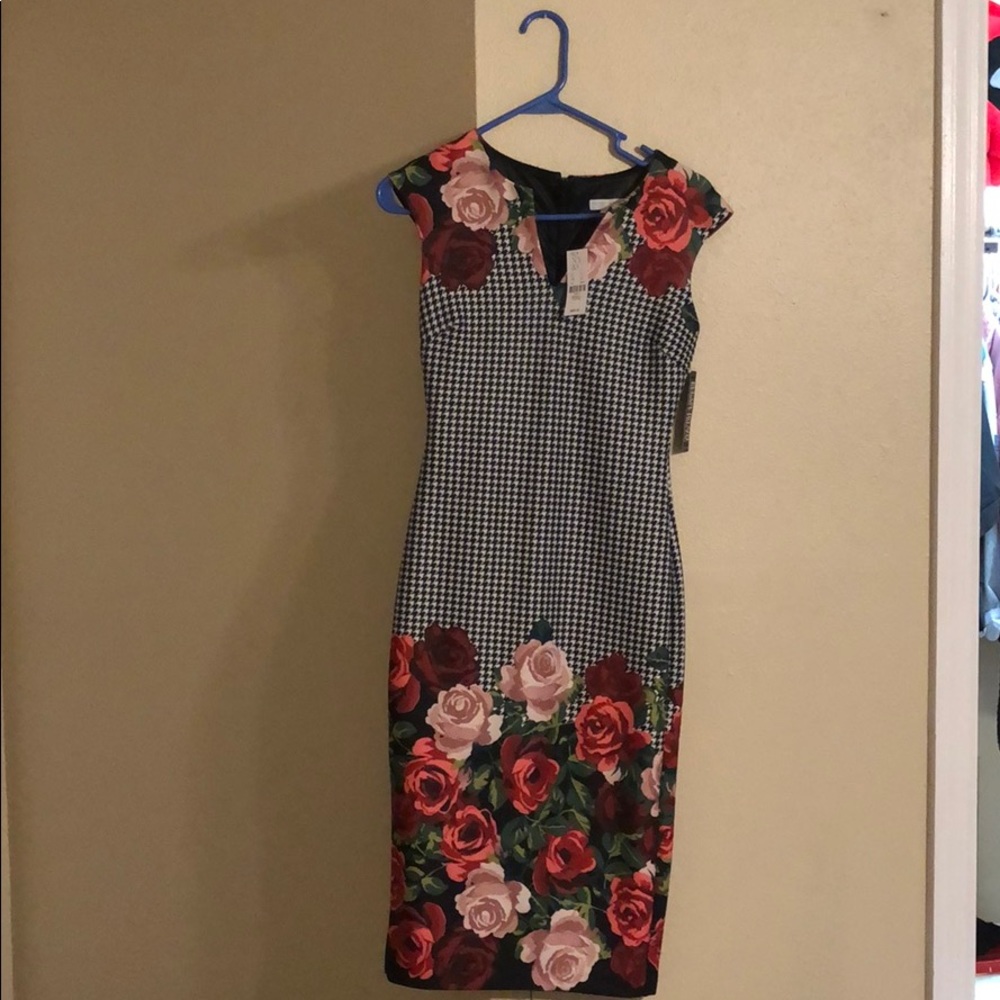 Black, white and rose colored dress